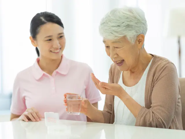 Caregiver with elderly woman